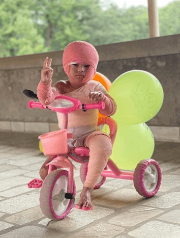 Sujal on a bike